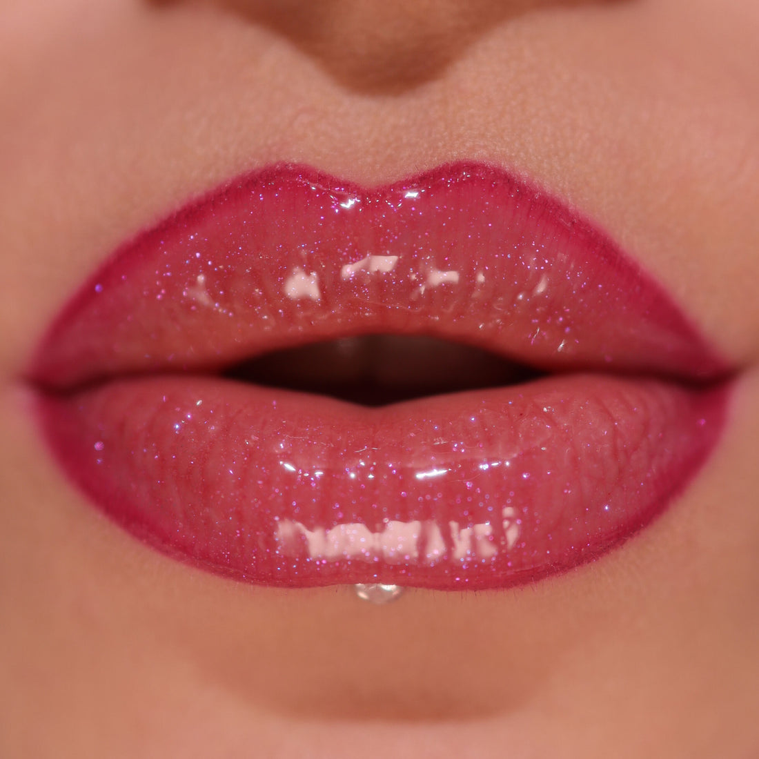 Revolution Pout Bomb Shimmer Gloss Berry Lustre